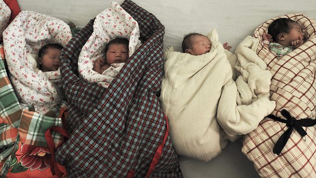 תינוקות בסין. ארכיון (צילום: AP) (צילום: AP)