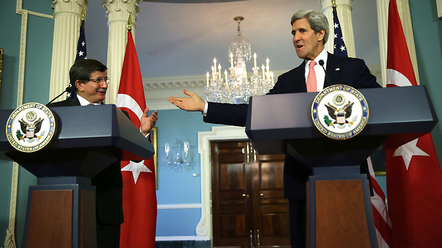 Kerry with Turkish counterpart, Tuesday (Photo: AFP)
