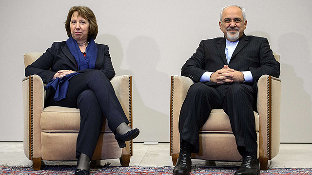 EU's Ashton with Iranian FM Zarif in Geneva (Photo: AFP)