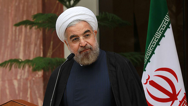 חסן רוחאני. "האיראנים ירצו תוכנית העשרה בסדר גודל תעשייתי" (צילום: FP PHOTO / HO / IRANIAN PRESIDENCY) (צילום: FP PHOTO / HO / IRANIAN PRESIDENCY)