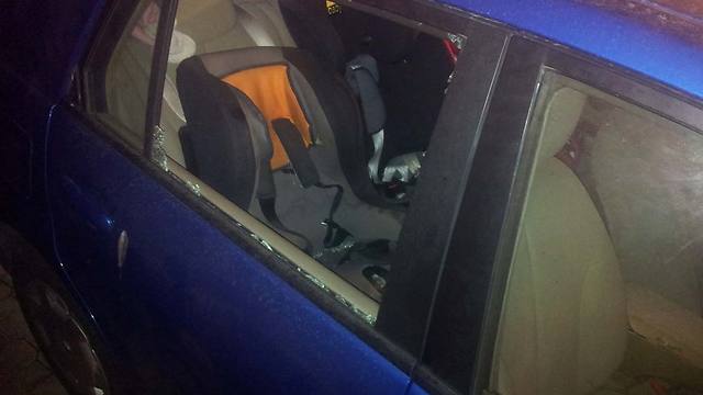 Broken car window (Photo: Noam Dvir)