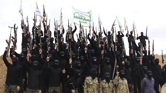 Al-Qaeda fighters during closing ceremony of training course, near Damascus (Photo: Reuters)  (Photo: Reuters)
