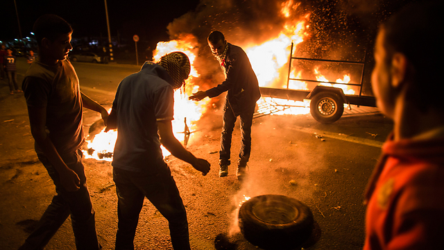 Hura rioters, 2013 (Photo: EPA)