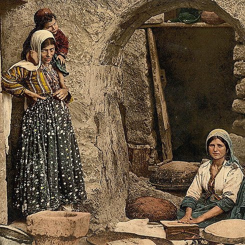 Syrian women preparing bread 