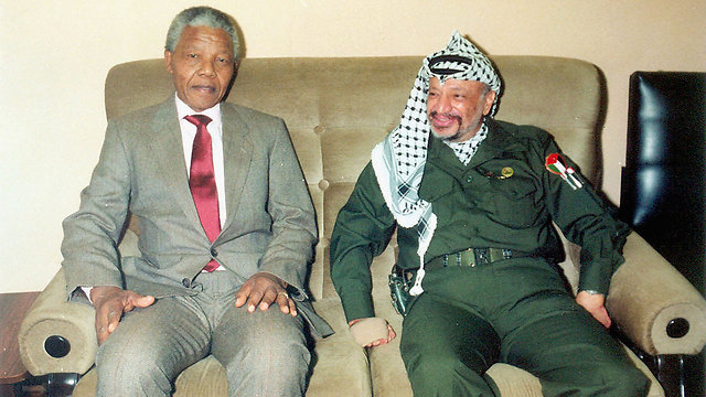 With Arafat, 1988 (Photo: Gettyimages)