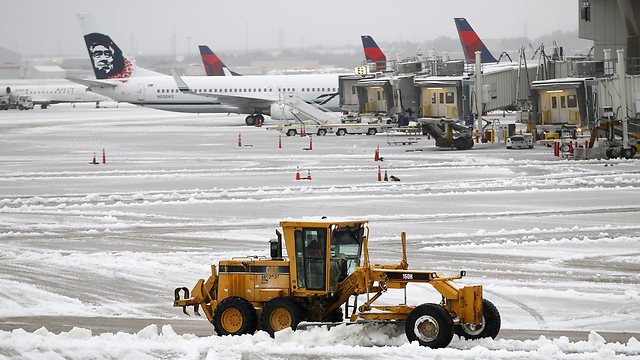כמעט 1,400 טיסות מדאלאס בוטלו בסוף השבוע (צילום: AP) (צילום: AP)