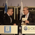 OECD Secretary-General Angel Gurria with Israeli Finance Minister Yair Lapid