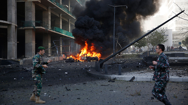 Burning vehicle in downtown Beirut (Photo: Reuters)