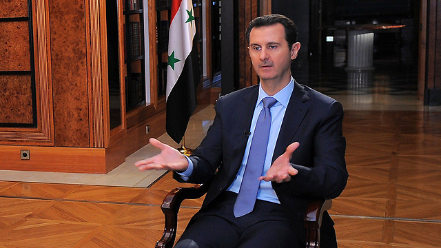 Not giving up his seat. Assad in interview to French news agency (Photo: AFP)