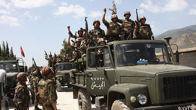 Syrian army soldiers in Jisr ash-Shugur (Photo: AP)