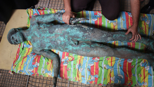 2,500 year-old statue on a mattress in Gaza (Photo: Reuters)