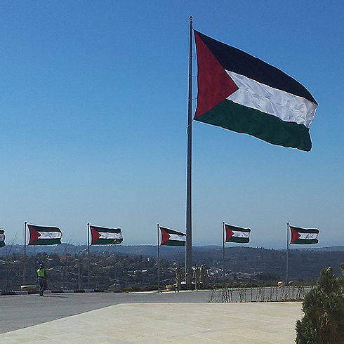 Palestinian flag waves over the future city