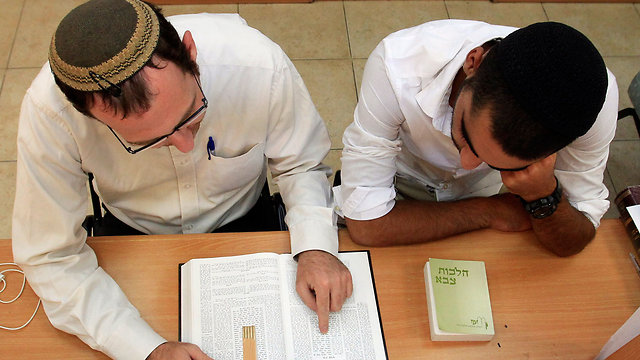 Realizing not everyone can be a torah expert, many ultra-Orthodox men are embracing a wider education. (Photo: Haim Zach)
