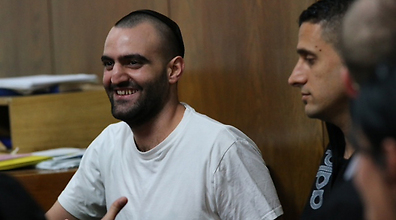 החיוך והשחרור. פליסיאן היום בבית המשפט (צילום: מוטי קמחי) (צילום: מוטי קמחי)