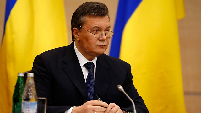 מנהיגי האופוזיציה החליפו אותו בשלטון. ינוקוביץ' (צילום: AP) (צילום: AP)