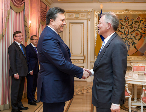 Serry with the president of Ukraine in 2014. (Associated Press)
