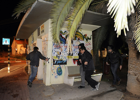 Sderot residents running for cover, Wednesday (Photo: AFP)
