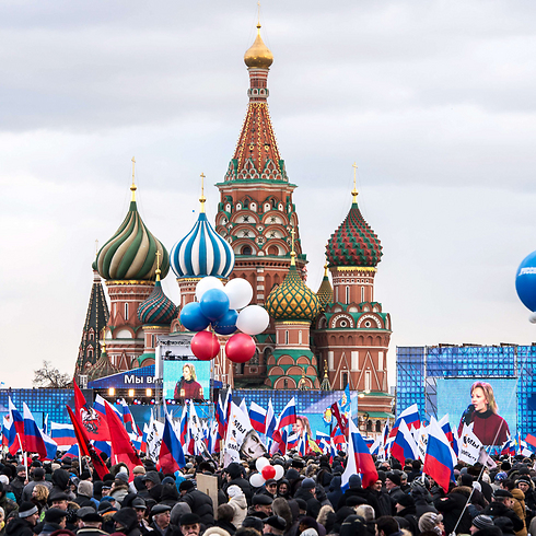 חגיגות הסיפוח בכיכר האדומה במוסקבה, אמש (צילום: AFP) (צילום: AFP)