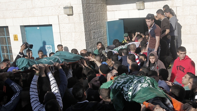 Bodies of the three Palestinians killed in the operation (Photo: AFP)