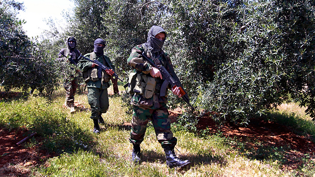 Hezbollah militants on the Syria-Lebanon border (Photo: AP)