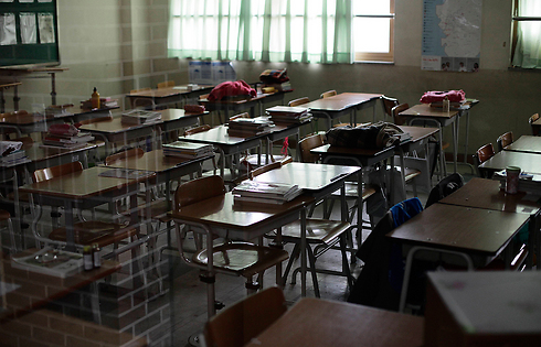 כיתה של תלמידים הנעדרים בבית הספר (צילום: AP) (צילום: AP)