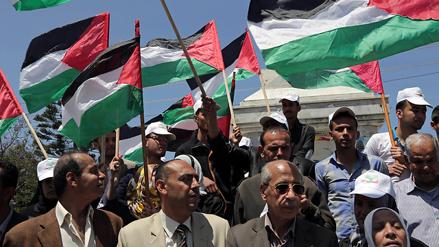 Palestinians protest for unity in Gaza City (Photo: AP)