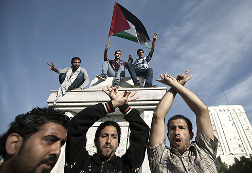 חגיגות בעזה. הפיוס זוכה לפופולריות בקרב הפלסטינים (צילום: AFP) (צילום: AFP)