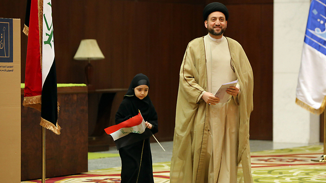 זכה ב-29 מושבים. מנהיג הגוש "אל-מוואטין" עמאר אל-חכים (צילום: AFP) (צילום: AFP)