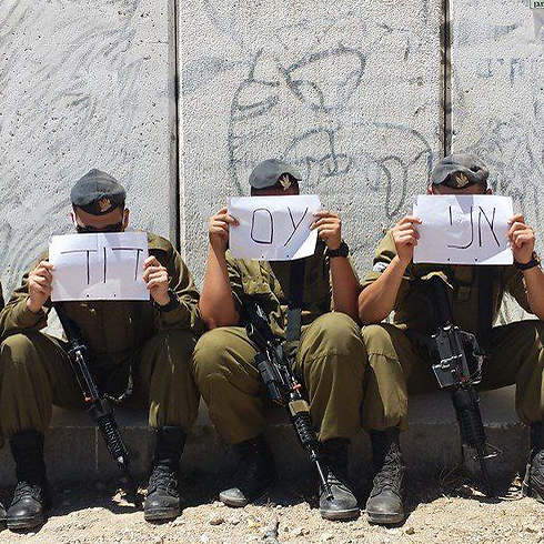 Soldiers participating in the Facebook protest