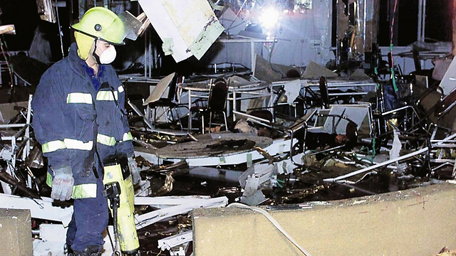 The attack at the Park Hotel in Netanya on the first night of Passover 2002, in which 30 people were killed (Photo: Shaul Golan)  