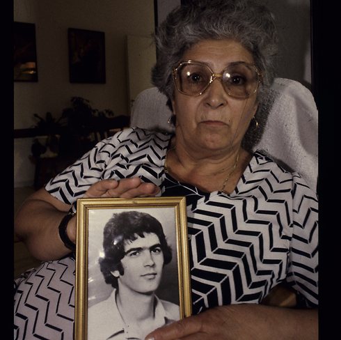 Tayeb's mother Shoshana with his picture. (Photo: Amikam Horesh) (Photo: Amikam Horesh)