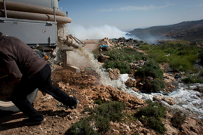 Sewage being spilled in a West Bank valley (Photo: AP)