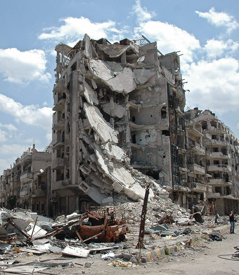 Wreckage in Homs (Photo: EPA)