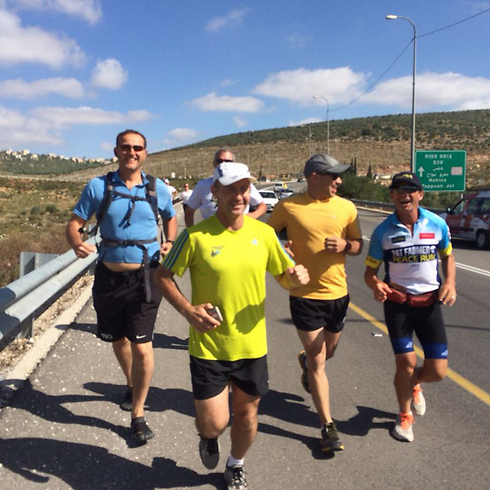 Group of Israelis running alongside Farmer before being asked to refrain from taking part (Photo: AriBriggs/Regavim) (Photo: AriBriggs/Regavim)