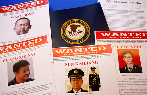 מבוקשים בארה"ב. הבכירים הסינים שנאשמים בריגול סייבר (צילום: AP) (צילום: AP)