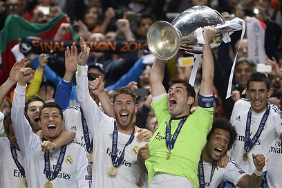 ריאל מדריד חוגגת את הזכיה בליגת האלופות בעונה שעברה (צילום: AFP) (צילום: AFP)
