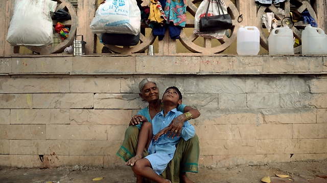 מומביי, הודו. יש מי שמתעקשים עוד לקרוא לה "בומביי" (צילום: AFP) (צילום: AFP)