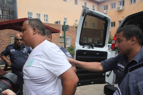 חסן במהלך מעצרו במאי האחרון (צילום: מוטי קמחי) (צילום: מוטי קמחי)