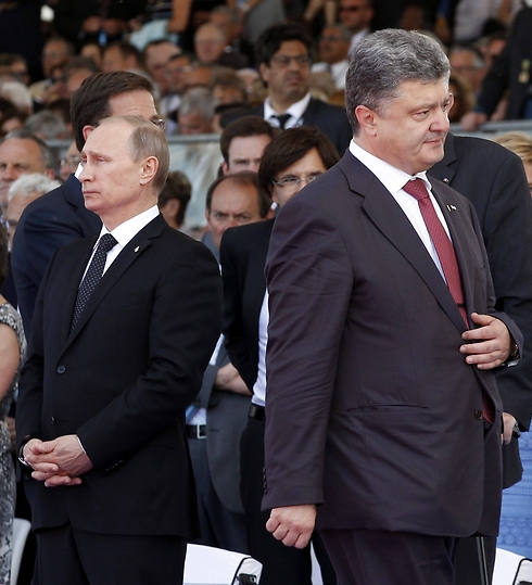 יחסים רעועים בין שתי המדינות. פוטין ועמיתו האוקראיני פורושנקו (צילום: EPA) (צילום: EPA)