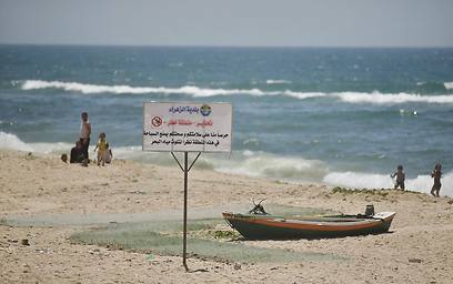 'Swimming is prohibited' sign at the Gaza beach (Photo: Reuters)