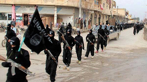Islamic State militants in Raqaa, Syria (Photo: AP) (Photo: AP)