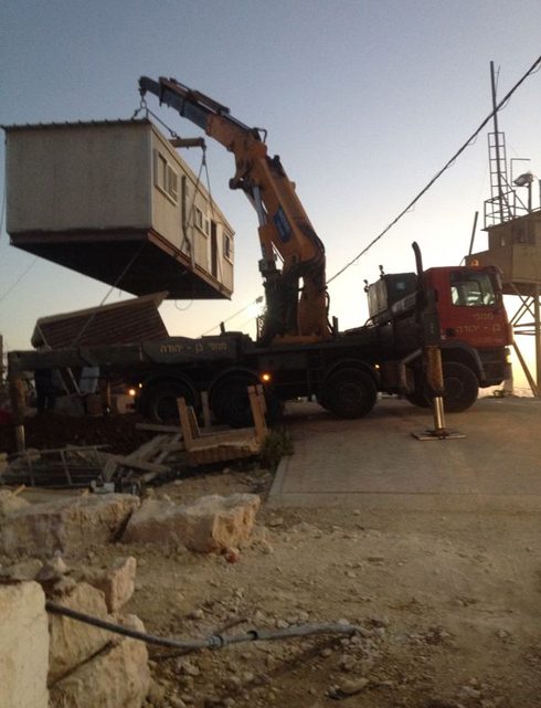 Trucks brought in Caravan style housing in the early morning. (Photo: Gush Etzion Regional Council) (Photo: Gush Etzion Regional Council)