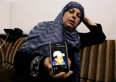 סוהא אבו חדיר, אמו של מוחמד (צילום: רויטרס) (צילום: רויטרס)