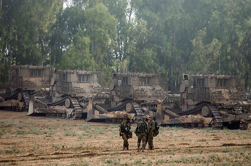 IDF troops and bulldozers after penetrating into Gaza. (Photo: AFP) (Photo: AFP)