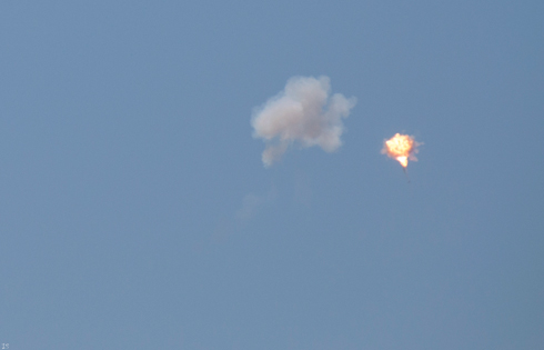 Mid-air Iron Dome interception of a rocket fired at Tel Aviv (Photo: Iris Shuv)