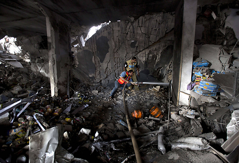 Gaza building in ruins after IAF strike (Photo: AFP)