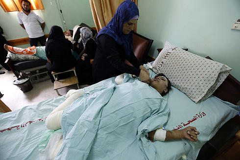 "מחכים למות. אין לנו כבר מה להפסיד". בית חולים בעזה (צילום: AFP) (צילום: AFP)