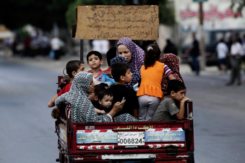 Palestinians fleeing the fighting in Gaza (Photo: AP)  (Photo: AP)