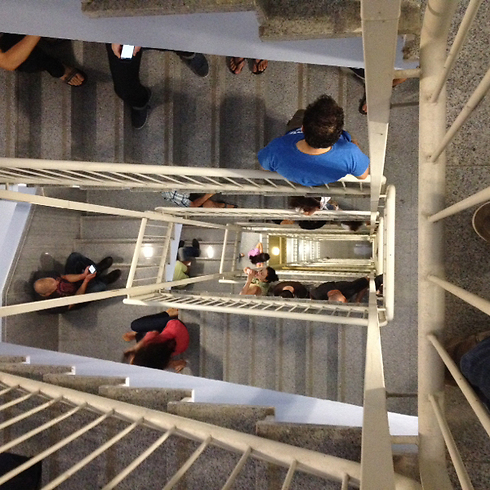 Seeking shelter in a stairwell