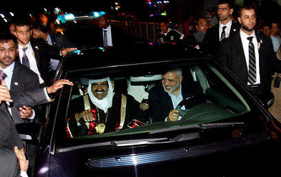 Former Qatari emir Al Thani and Ismail Haniyeh in Gaza in 2012 (Photo: AP) (Photo: AP)